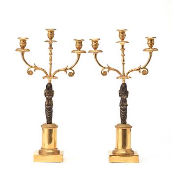 A pair of late Gustavian circa 1800 three-light candelabra.