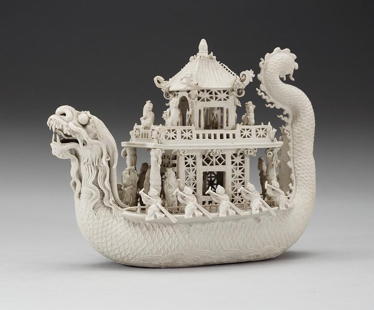 A white bisciut Dragon Boat, 19th Century.