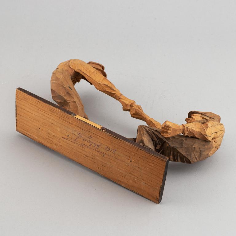 A Carl Johan Trygg wooden sculpture, signed and dated 1918.