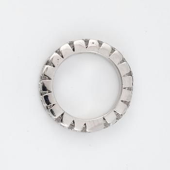 An eternity ring, set with brilliant-cut diamonds. Total carat weight 3.24 cts.
