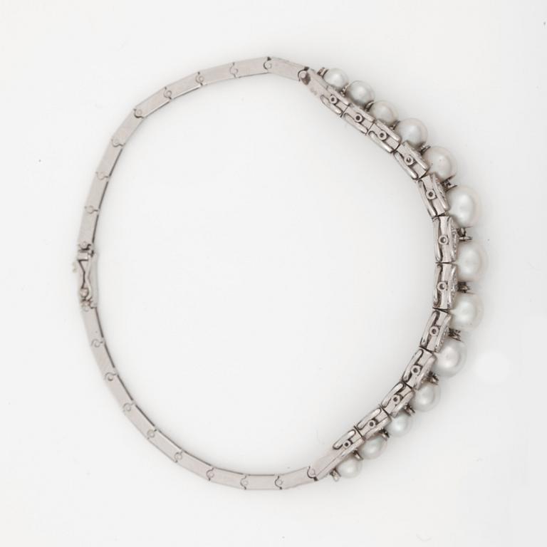 ARMBAND med orientaliska pärlor samt gammalslipade diamanter. I ask från David Andersen.