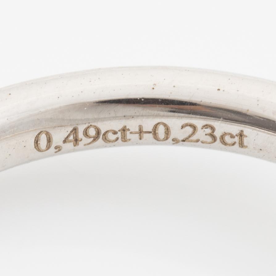 Ring 18K white gold set with a brilliant-cut diamond, accompanied by an IGI report.