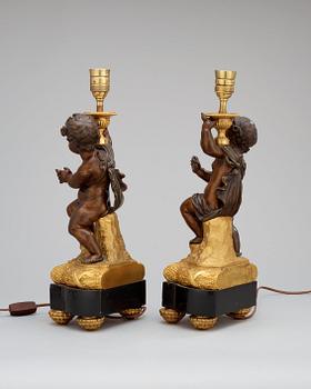 A pair of Louis XVI-style circa 1900 table lamps.