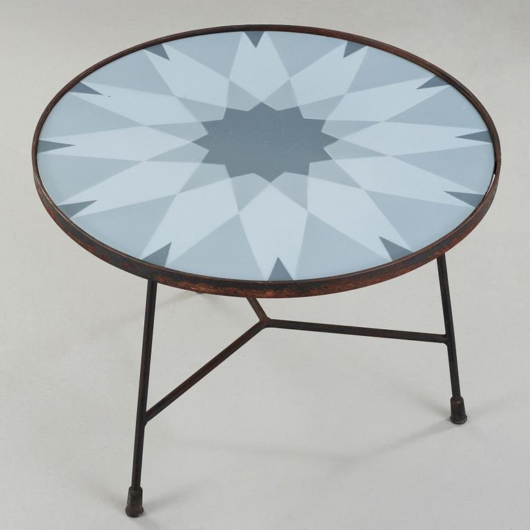 Kerstin Hörlin-Holmquist, an enamelled top table on an iron base, Nordiska Kompaniet, Sweden 1950's.