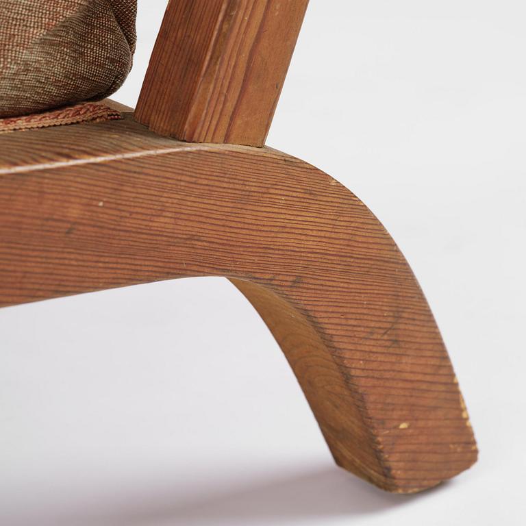 Axel Einar Hjorth, a stained pine "Väddö" easy chair, Nordiska Kompaniet, Sweden, 1930s-40s.