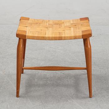 A model '967' mahogany and rattan stool by Josef Frank for Firma Svenskt Tenn.