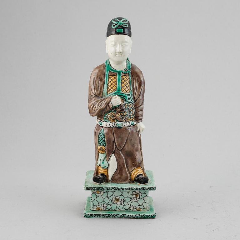 A porcelain figure of a scholar, Qing dynasty, 18th Century.