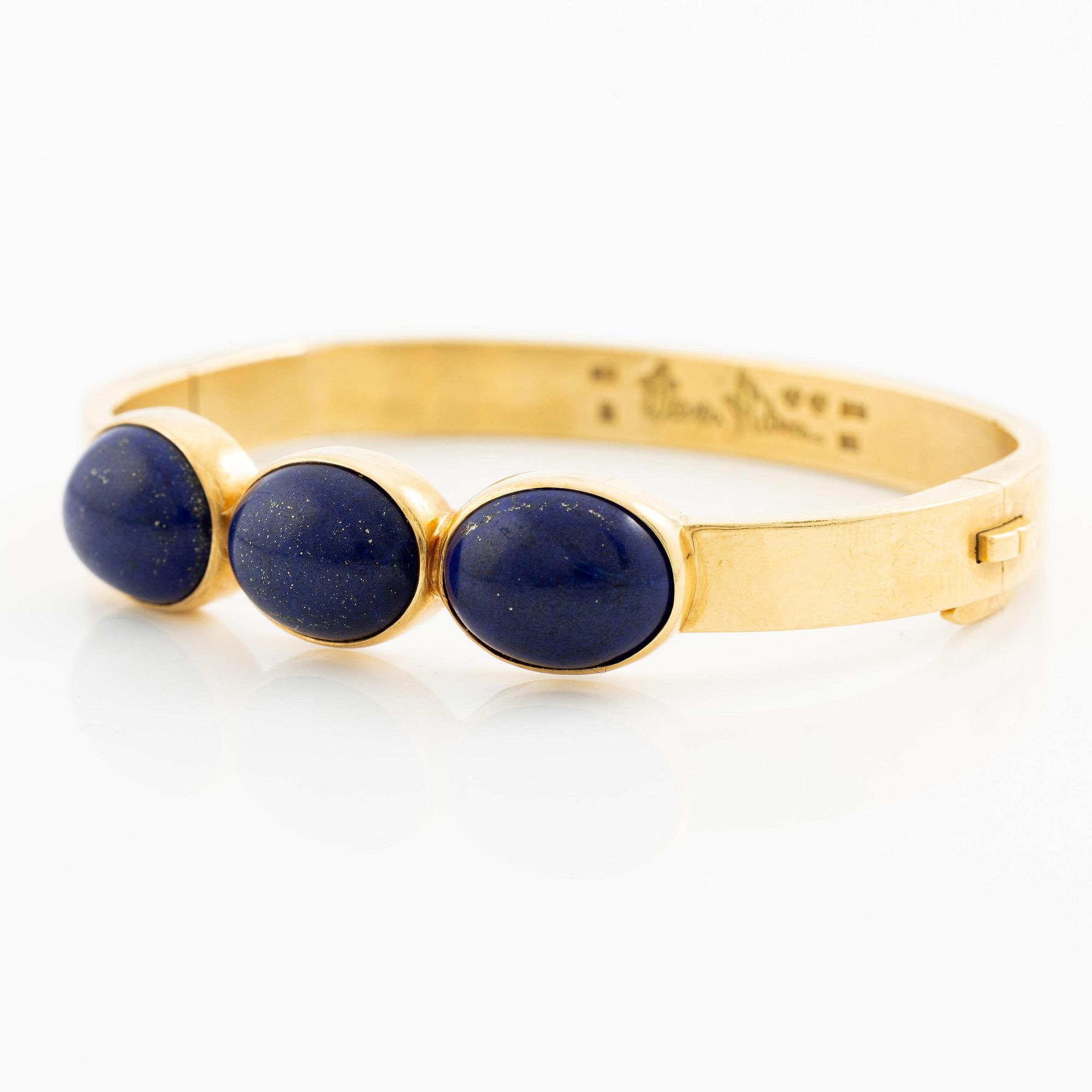 Wiwen Nilsson, a bracelet, 18K gold with lapis lazuli, Lund 1965.