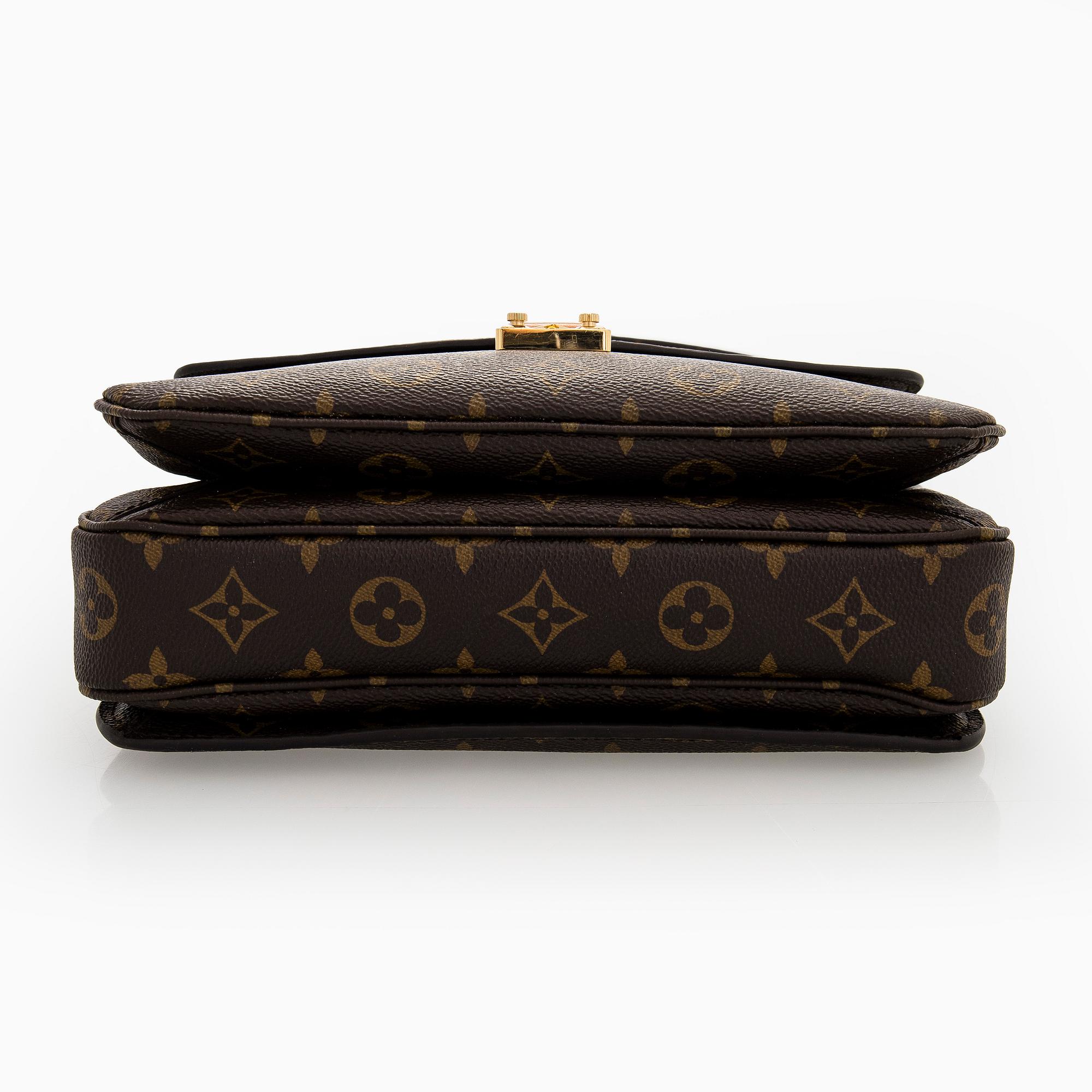 Louis Vuitton, a Monogram Canvas 'Pochette Metis' bag.