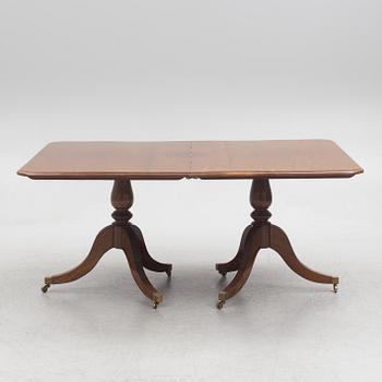 A two-part mahogany Georgian/Victorian dining table, England, first half of the 20th century.