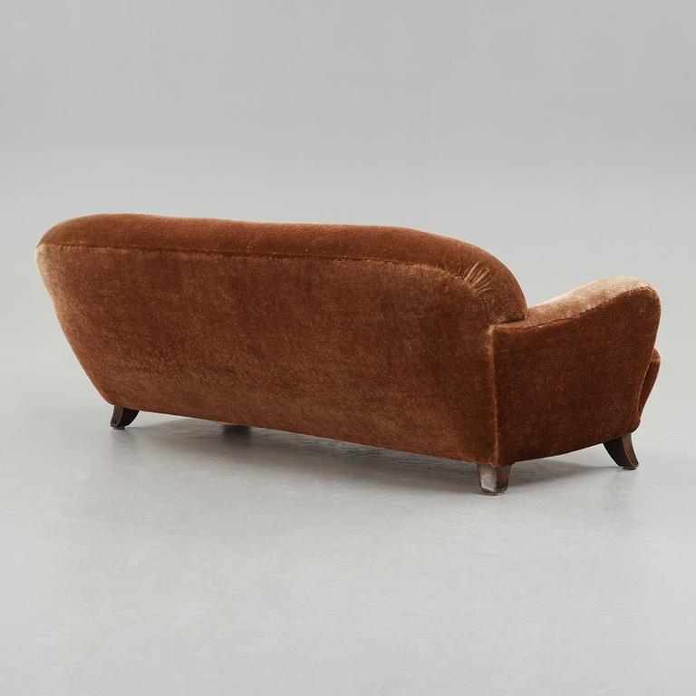 A Mid Century Modern sofa, probably ca 1939.