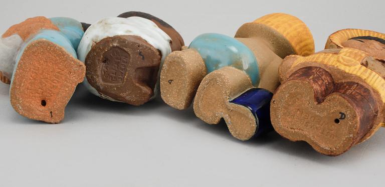 Four figurines designed by Lisa Larson for Gustavsberg.