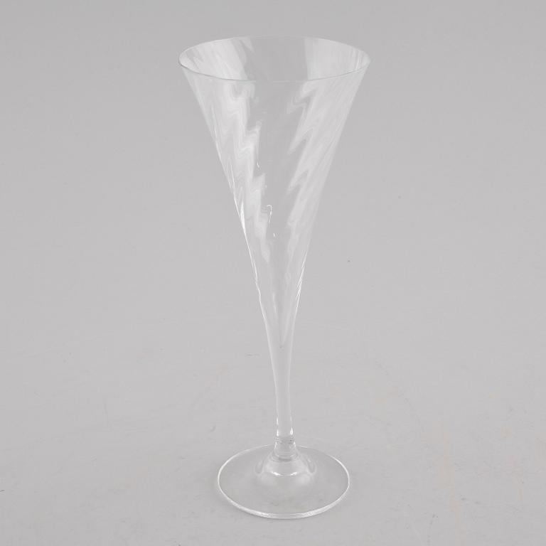 Twelve champagne glasses named "Heléna", designed by Gunnar Cyrén for Orrefors. Designed in 1977.