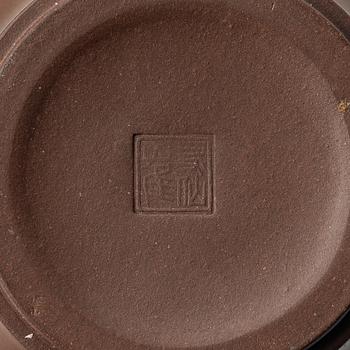 A group of Chinese yixing teapots, 1980s.