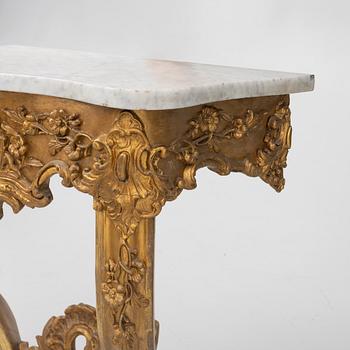 A Rococo style console table, late 19th Century.