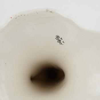 A pair of 'Daladansen' creamware candelabra from Rörstrand, Art Nouveau, early 20th Century.