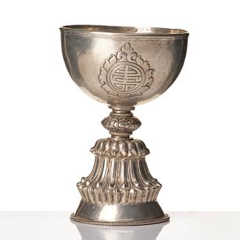 A Tibetan butter lamp, silvered copper, 20th Century.