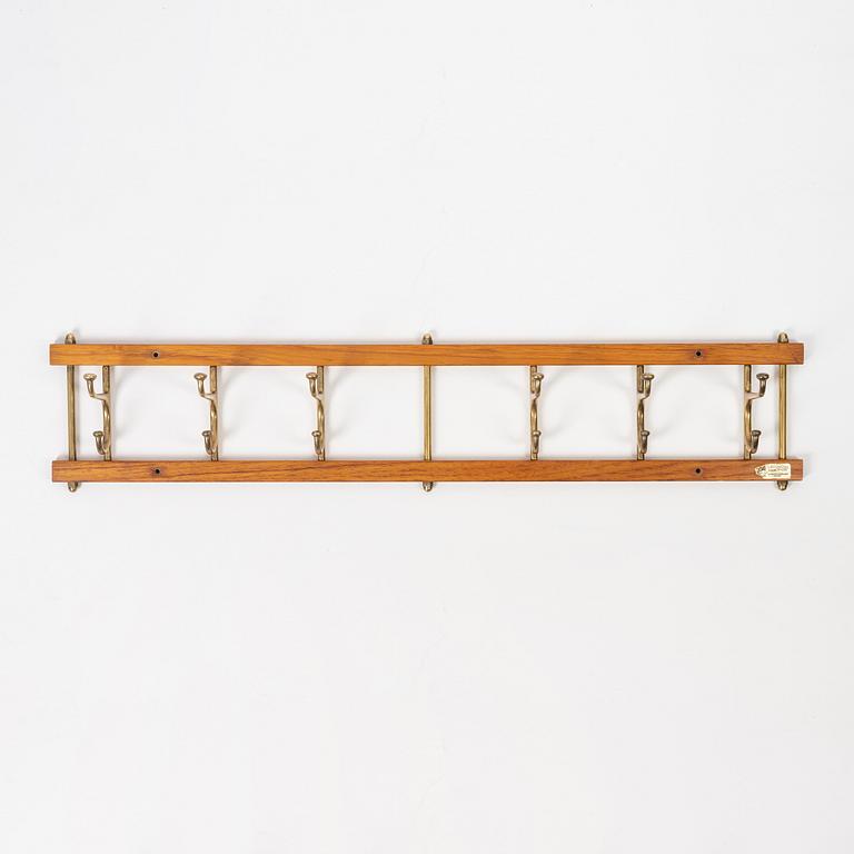 Klädhängare, "Dekorativ", Skoglunds metallgjuteri, Anderstorp, 1950/60-tal.