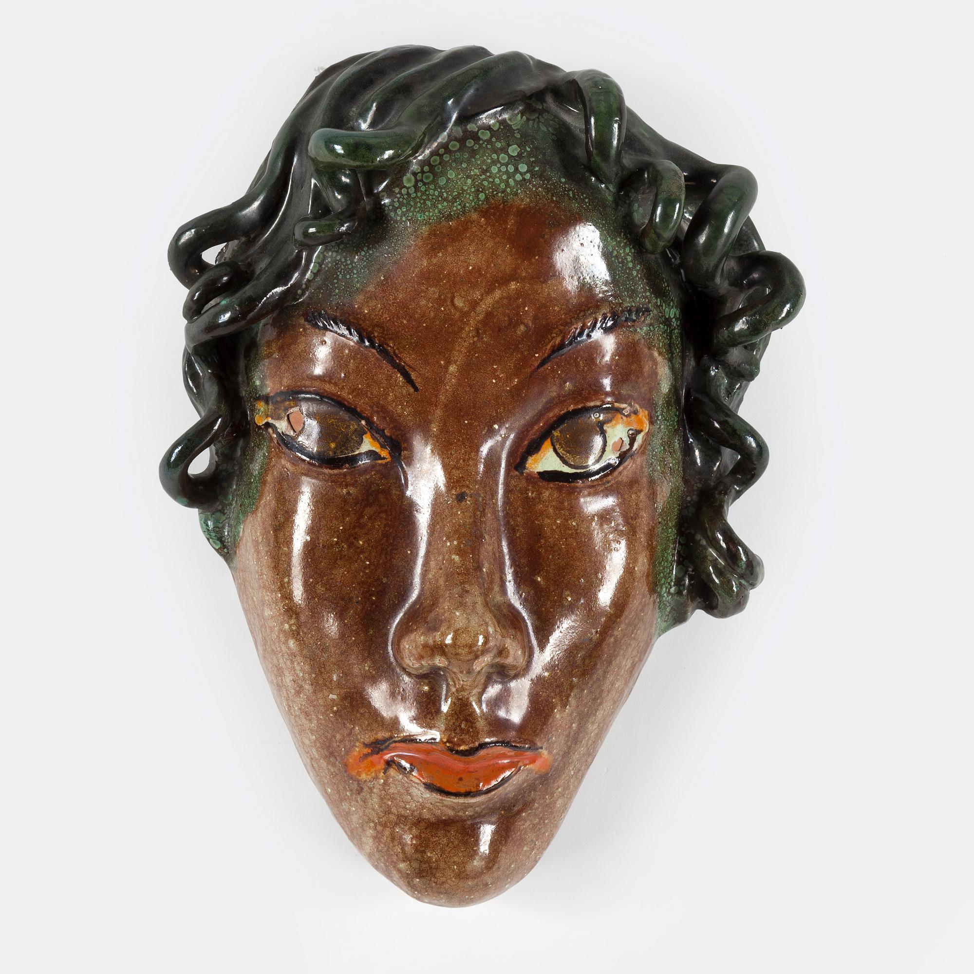 ALLAN EBELING, an earthenware decorative mask from Torshälla, signed.