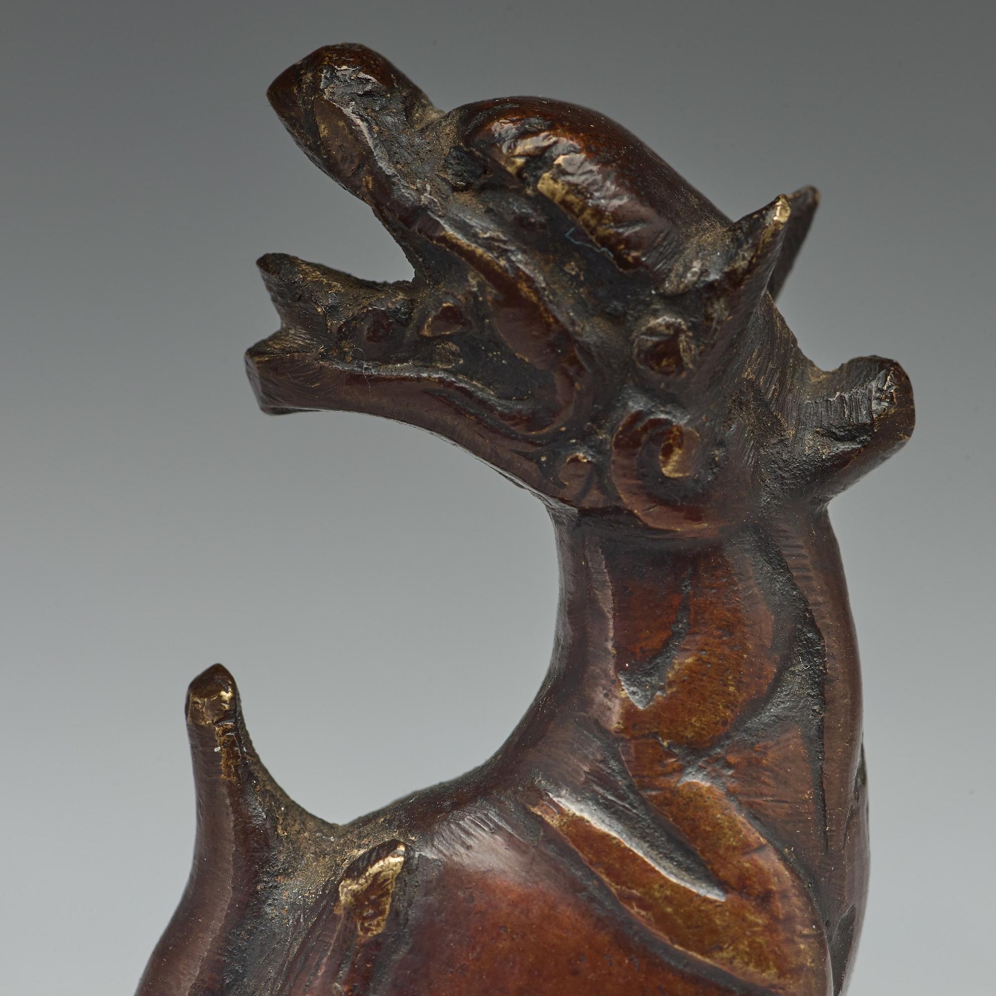Two bronze pen rests, Qing dynasty, 18th Century.