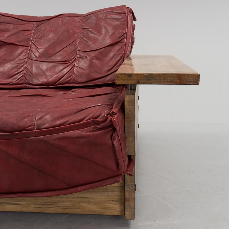A Hämeen Kalustaja Finnish stained pine sofa, 1970's.