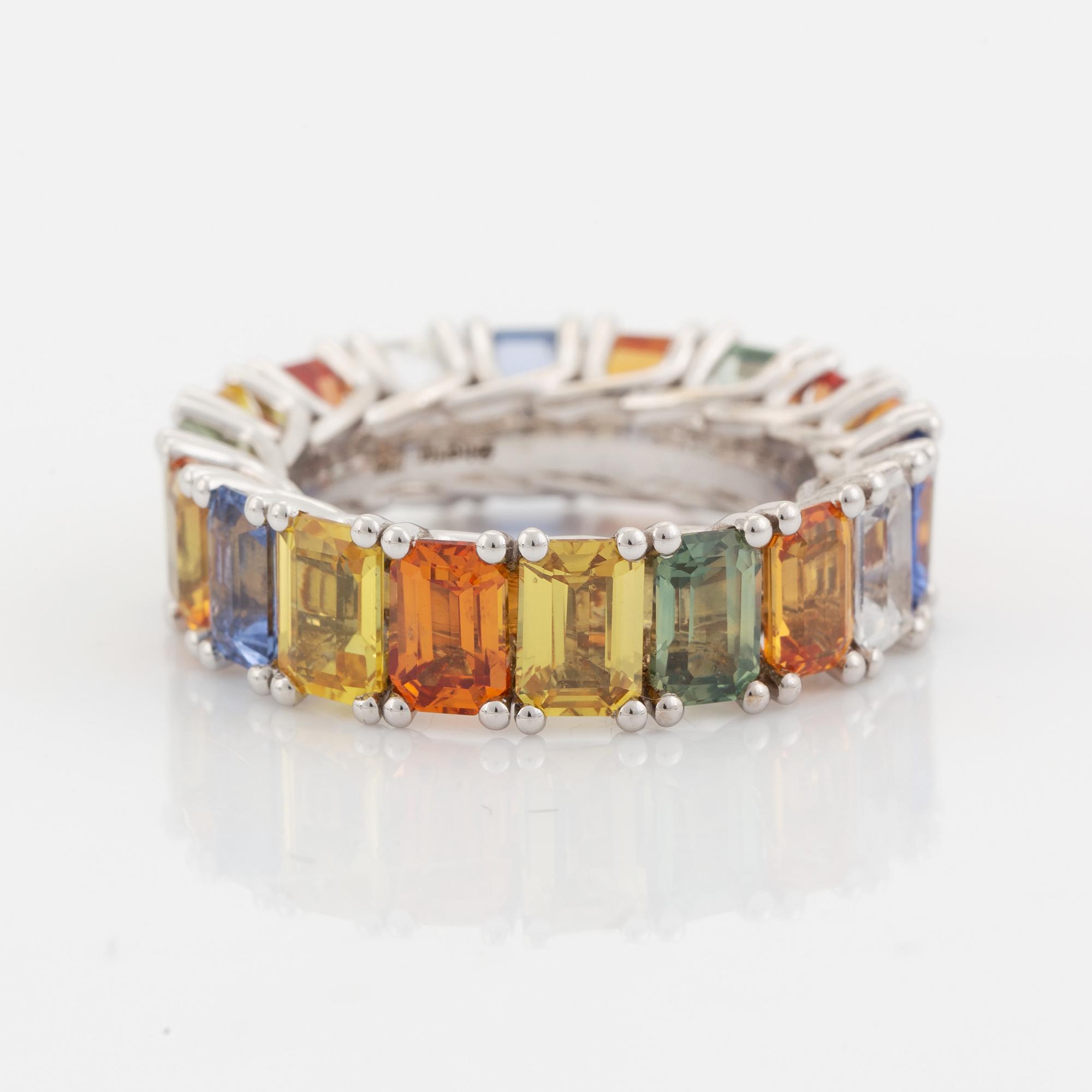 Emerald cut multi coloured sapphire ring.