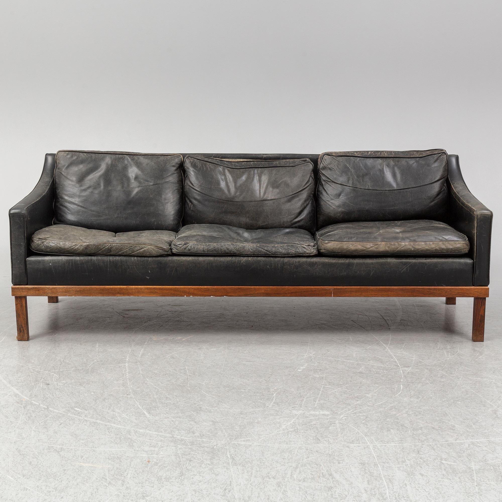 A black leather "The President" sofa by Ingemar Thillmark for OPE-möbler. Sweden.