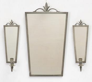 A mirror and pair of wall sconces, Sweden, 1932.