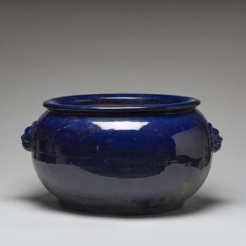 A large blue glazed flower pot/censer, presumably late Qing dynasty.