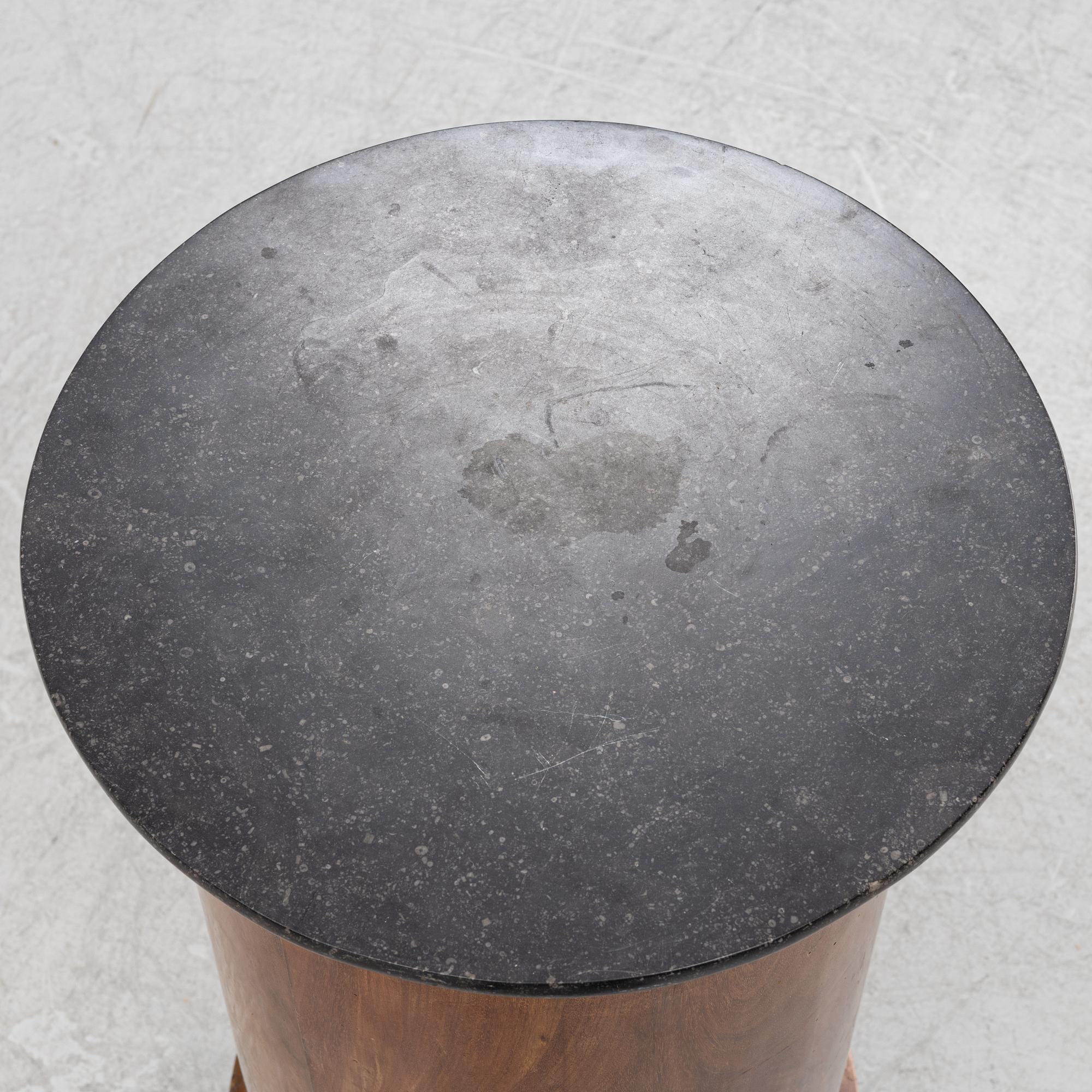 A mahogany veneered cabinet/bedside table with stone top, 19th Century.