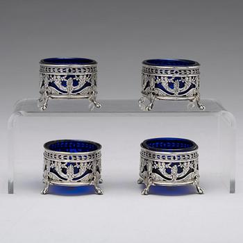 A Belgian set of four 19th century silver and glass salts, marks are Hanau Pseudo marks of "Wolf & Knell", after 1887.