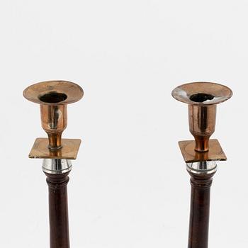A pair of 19th century candlesticks in wood and brass and white metal.