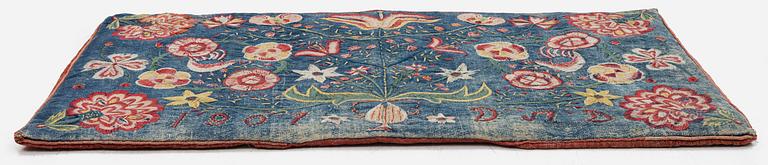 A flat weave carrige cushion, c. 99 x 54 cm, Wemmenhög district, Scania, Sweden, signed and dated DAD 1807.