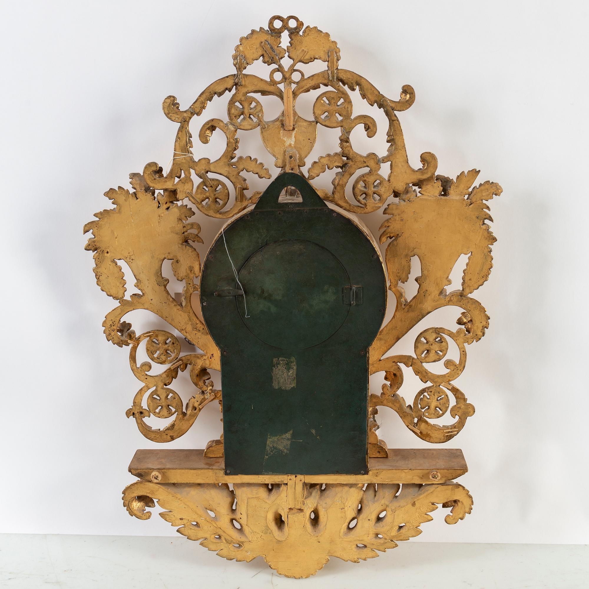 A late Empire wall clock by E. Engelbrechten.