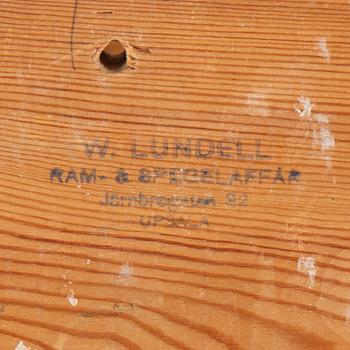 A mirror and console table from around the year 1900.