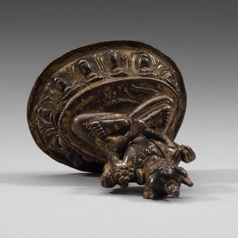 A Tibetan copper alloy figure of Bodhisattva Shadakshari Lokeshvara, with traces of gilding, 16th century.