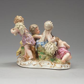 A set of four Meissen allegorical figure groups, 18th Century, three of them with the Marcolini mark (1774-1814).