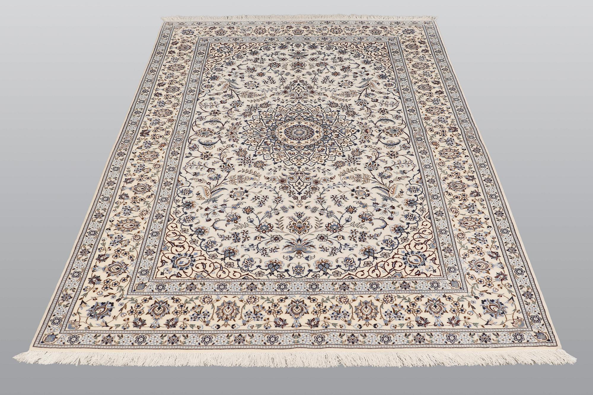 A carpet, Nain part silk s.k 6 LAA, 238 x 148 cm.