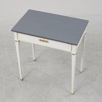 A Gustavian style table, first half of the 20th century.