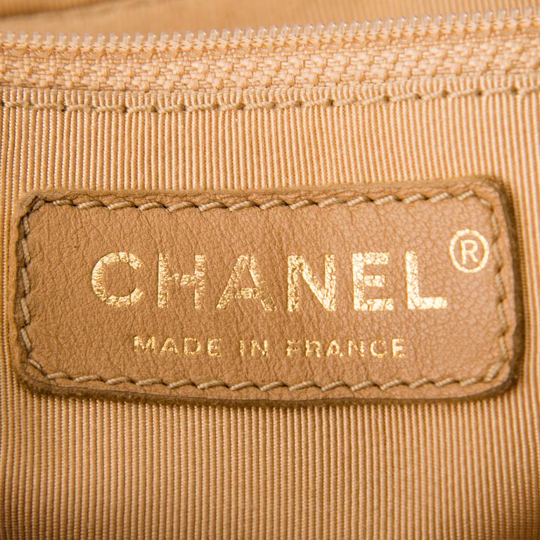 CHANEL Beige Caviar Leather Shoulder Bag.