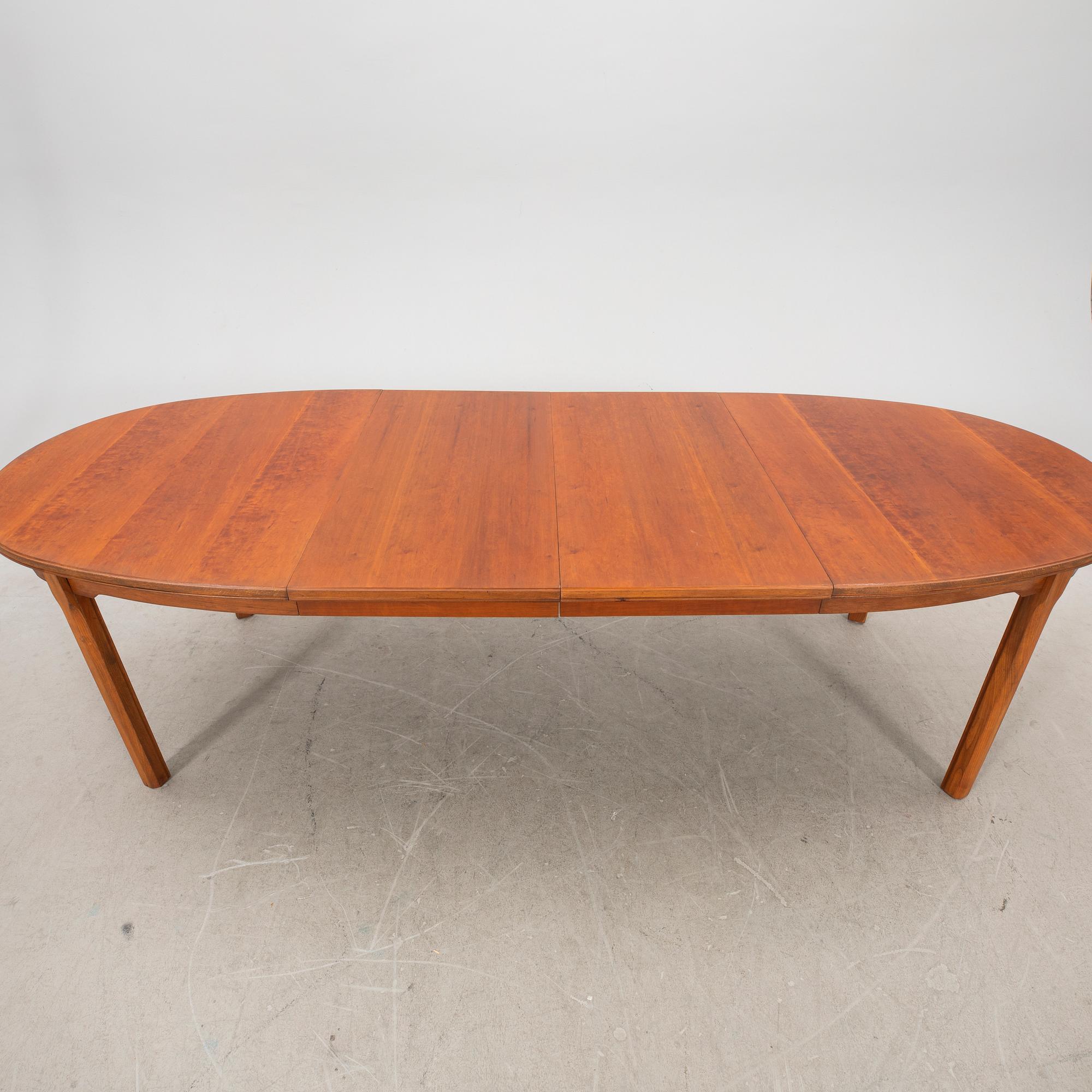 A walnut dining table, "Bristol" 1960s.