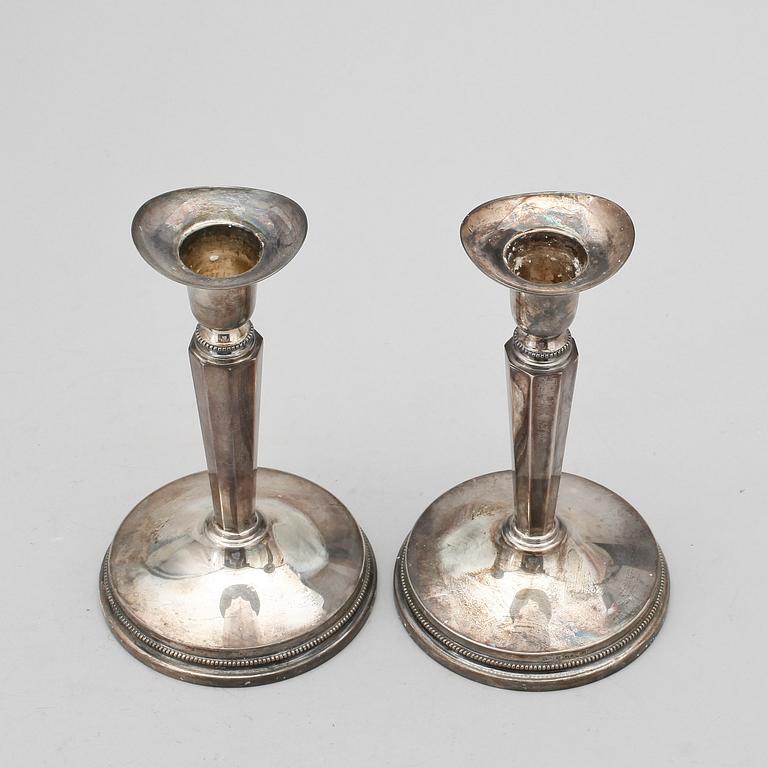 LJUSSTAKAR, ett par, silver, MGAB, Uppsala, 1957.