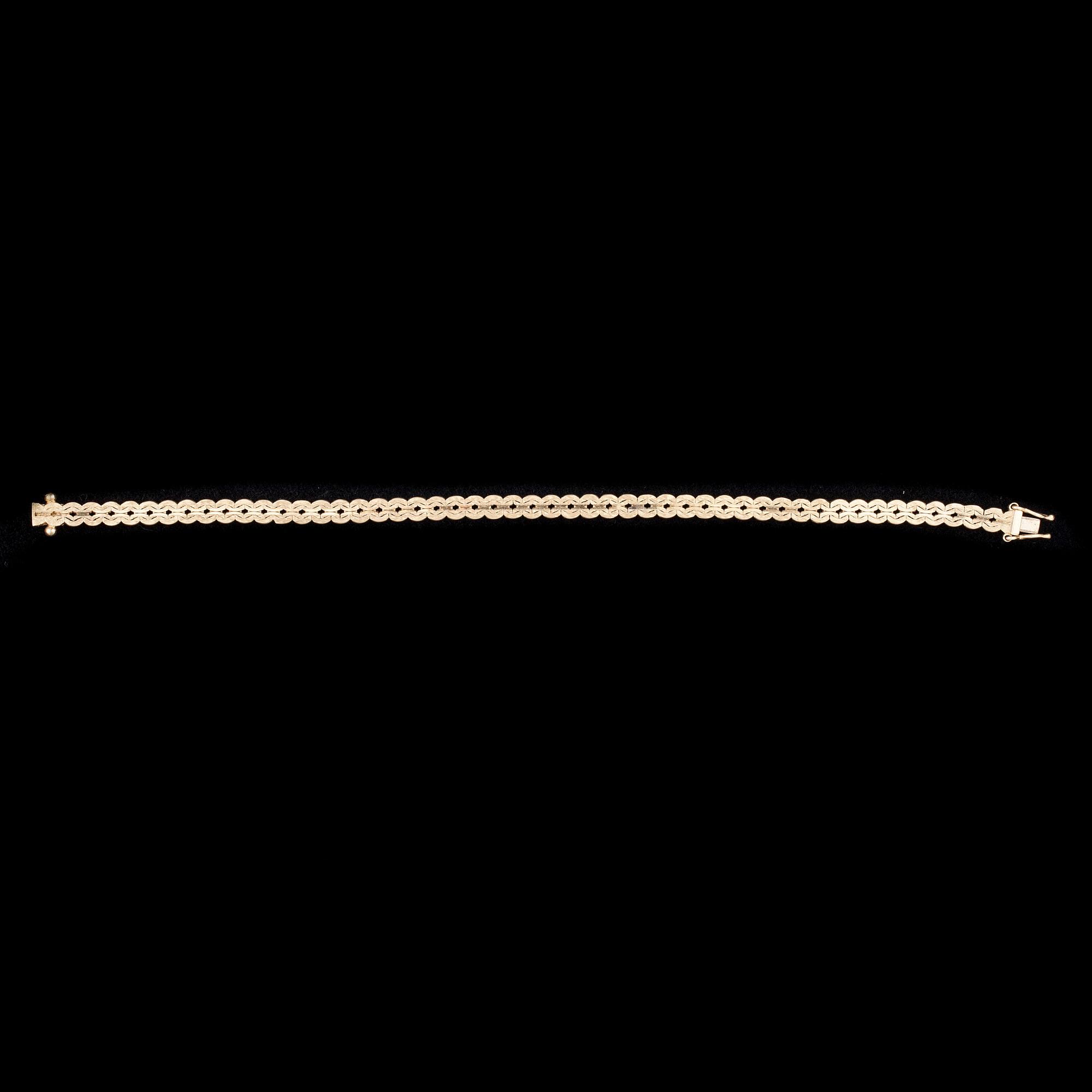ARMKED, 14K guld. Kellomiehet 1976. Vikt ca 11,0 g.