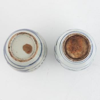 A group of two Chinese blue and white bowls and two jars, Qing dynasty, 19th century.