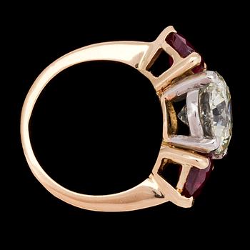 A brilliant cut diamond, 3.63 ct, and ruby ring.