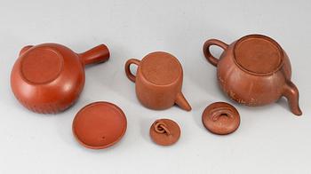 A group of three yixing pots, 20th century.