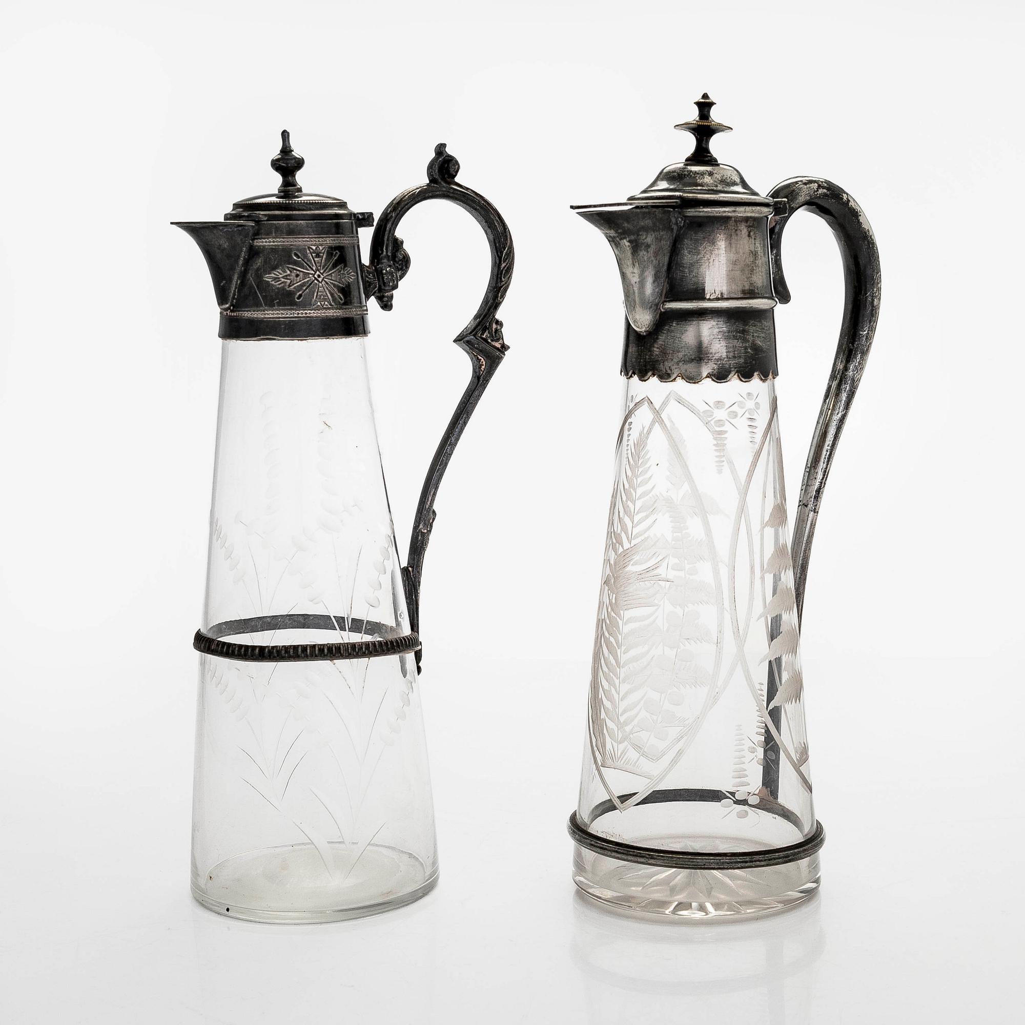 Two wine pitches, around 1900.