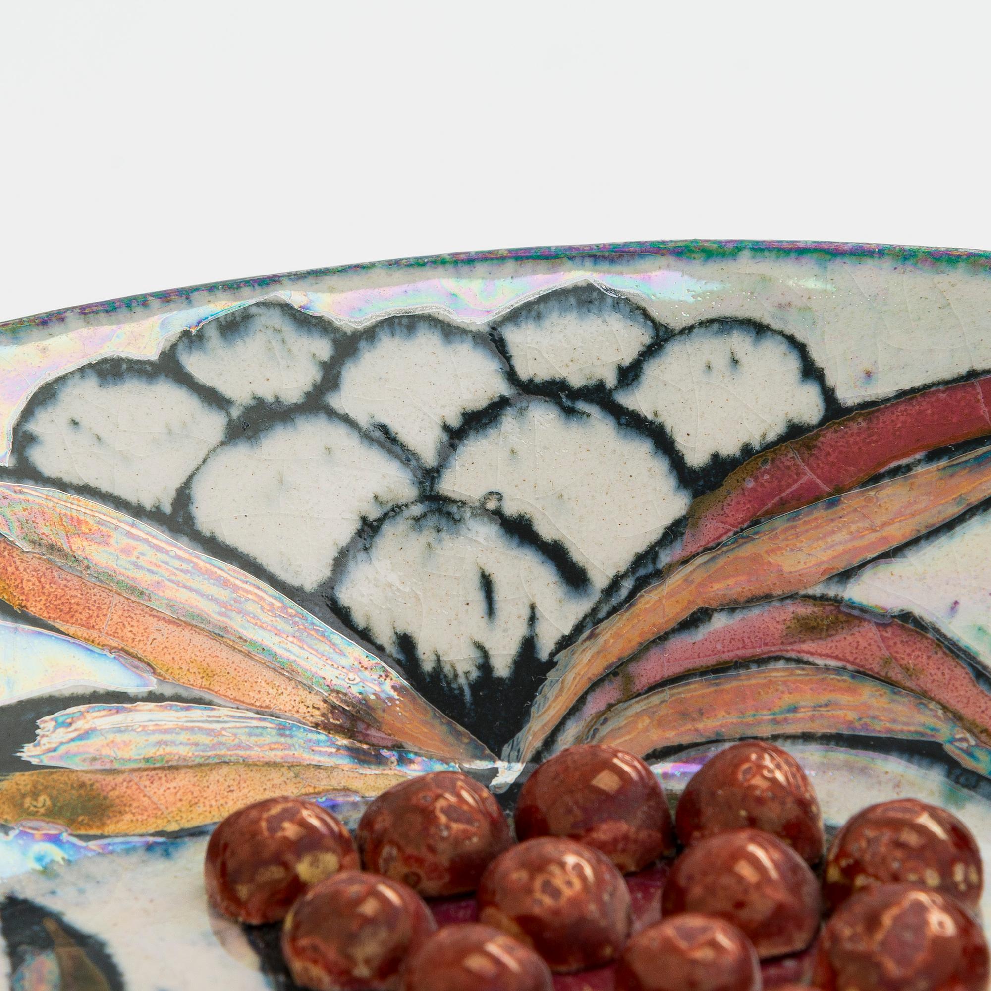 Birger Kaipiainen, a stoneware, decorative plate signed Kaipiainen Arabia.