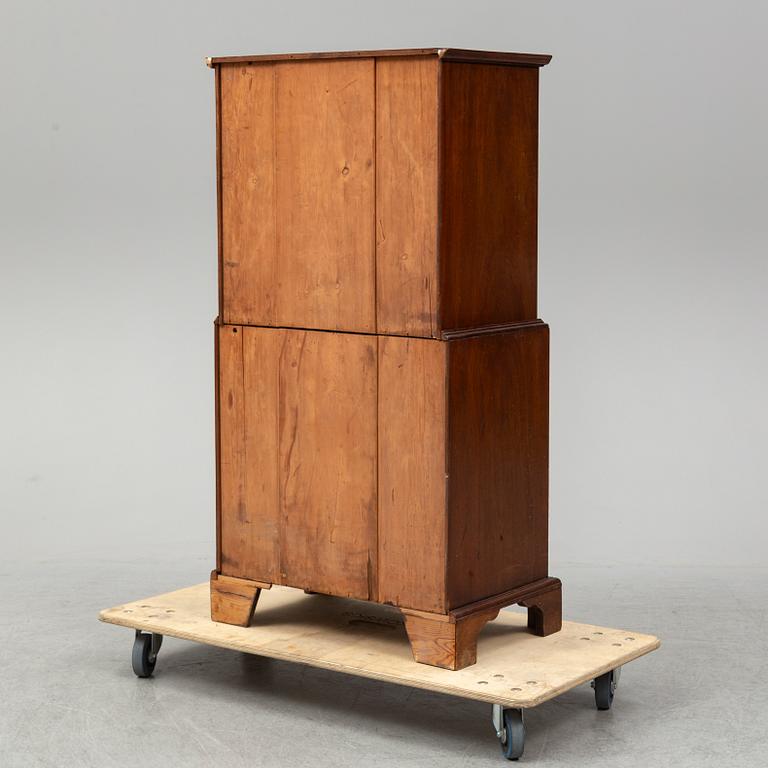 A mahogany 'Tallboy' chest of drawers.