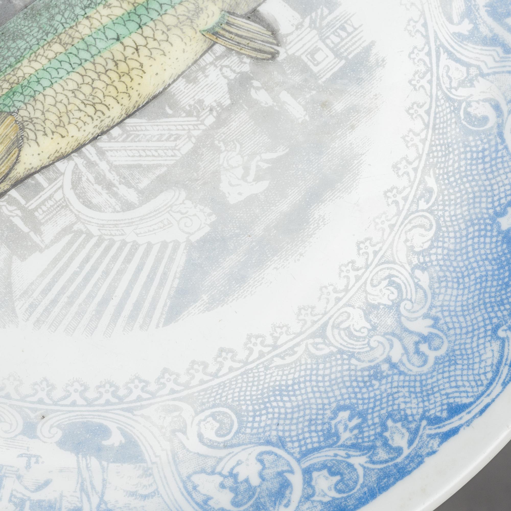 PIERO FORNASETTI, 2 "Arcimboldesca" plates + 1 "Piscibus" plate,